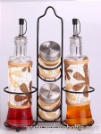 Set of glass oil bottles and spice jars in an iron shelf